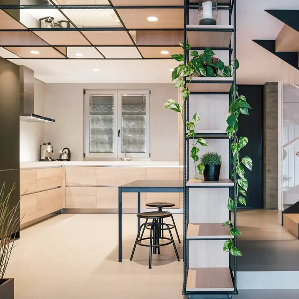A kitchen with microcement surfaces